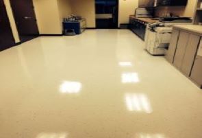 Office with shiny VCT tile just waxed.